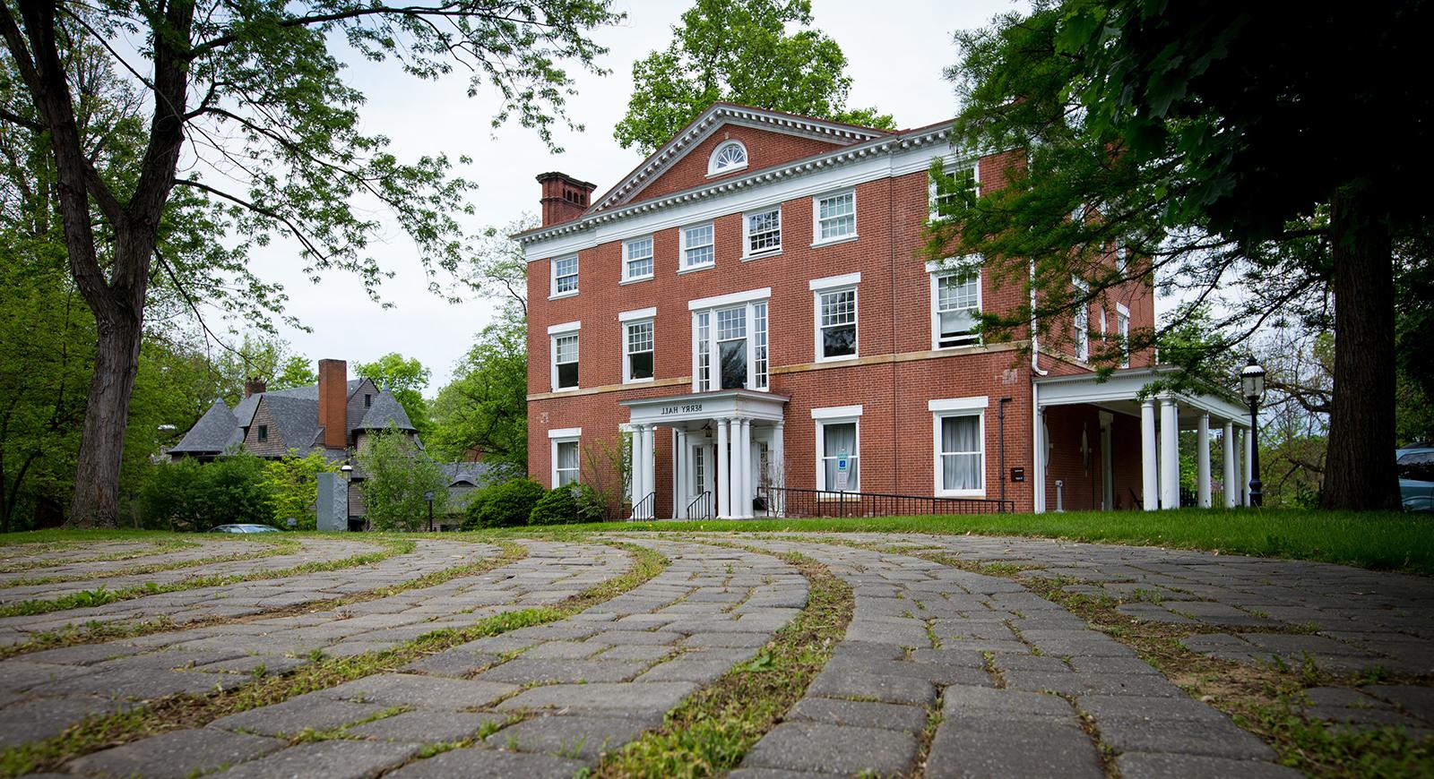 Photo of red brick Berry Hall on Chatham University's Shadyside Campus